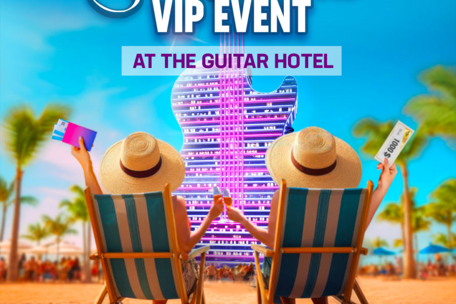 Star-studded vip event at the guitar hotel with two guests relaxing on the beach